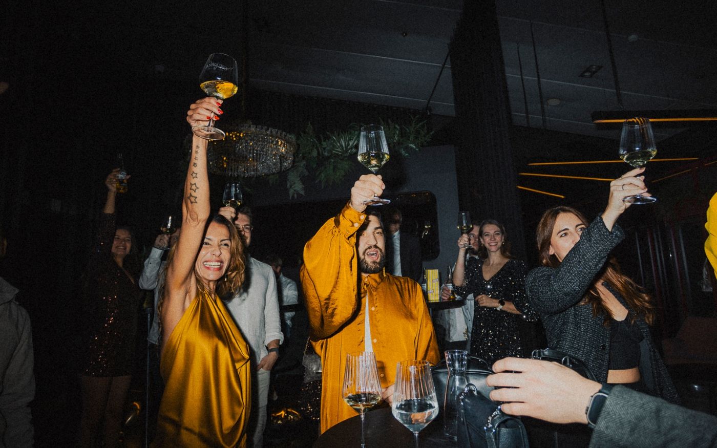 Guests celebrating at a Helloi. event